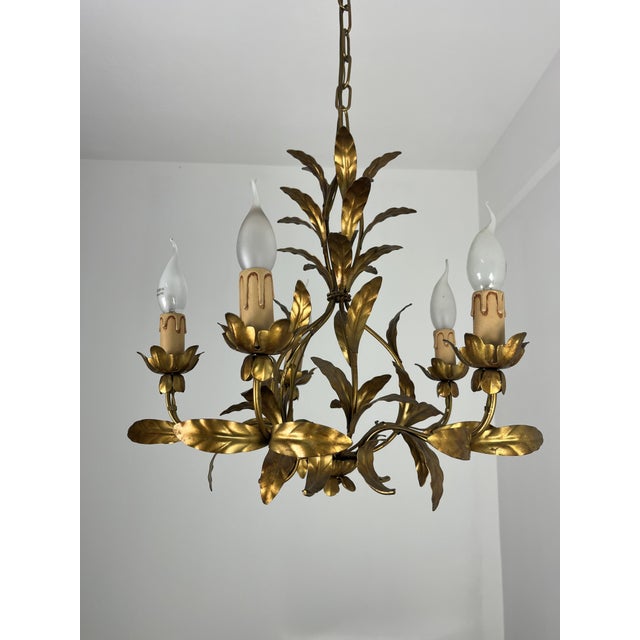 Italian 5-light wrought iron chandelier, 1950s Intact and in good condition, E14 bulbs Up to 250V (Europe/UK Standard).The...