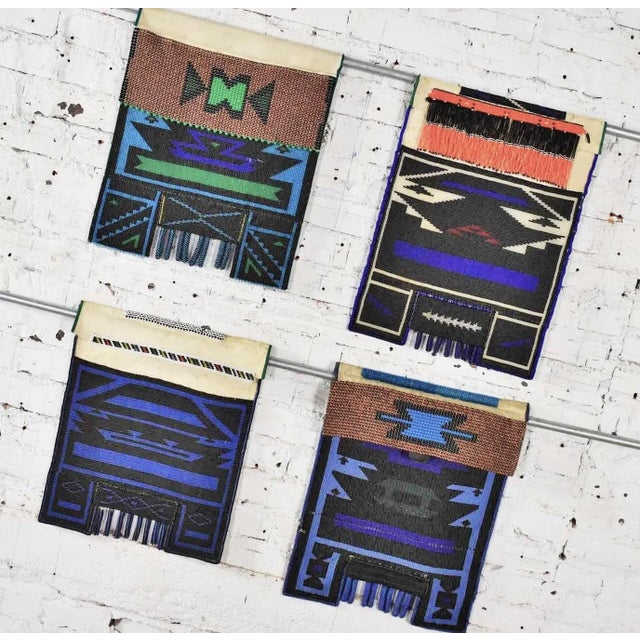 Handsome set of four Ndebele Mapoto beaded aprons from South Africa. They are canvas backed and in awesome condition. We...