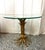 LaBarge Hollywood Regency style gold leaf wheat sheaf table with glass top. Circa 1960’s Made in Italy Measures 24” d...