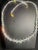 graduated, faceted glass crystal beads treated with an Aurora Borealis (AB) that gives the clear glass its characteristic...