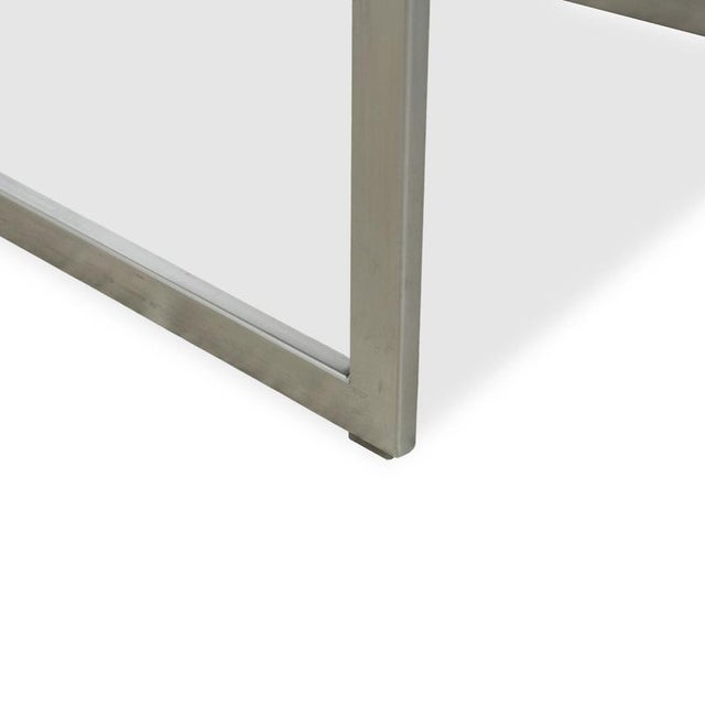 This set of four identical chairs from KFF is an elegant addition to any modern living or dining room. The cantilevered...