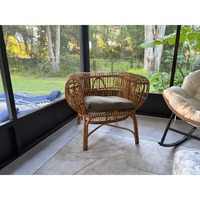 Mid Century Modern rattan chair from the 1960s in the style of Paolo Tilche Wear and tear commensurate with age. Pictures...