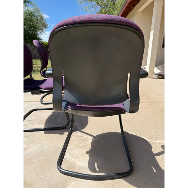 A rare and stylish set of vintage Herman Miller Equa chairs from the late 1990s, including four side chairs and one...