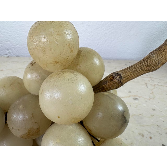This is a mid-century vintage hand card alabaster grape cluster. These grapes are sculpted from cream colored alabaster...