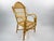 A charming vintage French rattan children’s chair dating from the 1950s. Handwoven with elegant braided arms, an arched...