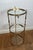 1940s Round brass pedestal table with three glass shelves. French work Attributed to Maison Jansen For Sale - Image 6 of 9
