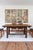 A French brutalist dining table attributed to the cabinetmaker Georges Robert, working in the 1960s in the same register...