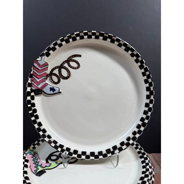 This fabulous set of six plates was created by artist Robin Sterling for Barneys New York. With the hand-painted...