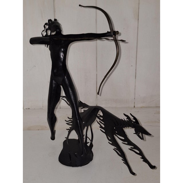 Sculpture Diana on the Hunt in Black Lacquered Metal, 1960s, in Very Good conditions. Designed 1960 to 1969 This piece is...