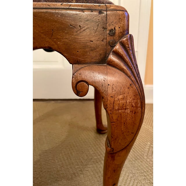 We love this stool and its fabulous curves. The old walnut has the most beautiful patina and it is complimented so...