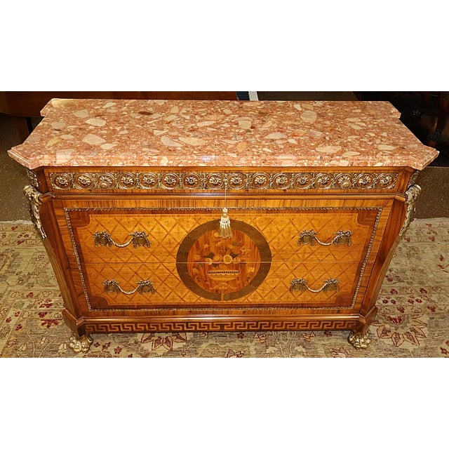 ​Italian Made Louis XVI Style Ormolu Inlaid Marble Top Dresser Chest Commode Dimensions : 56" Wide X 22" Deep X 38" Tall...