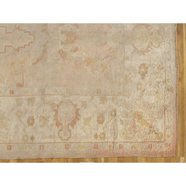 Oushak rugs, also known as Ushak rugs, are woven in Western Turkey and have distinct designs, such as angular large-scale...