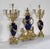 Superb set of blue ceramic and gilt bronze consisting of a large clock and a pair of candlesticks with six arms of light....