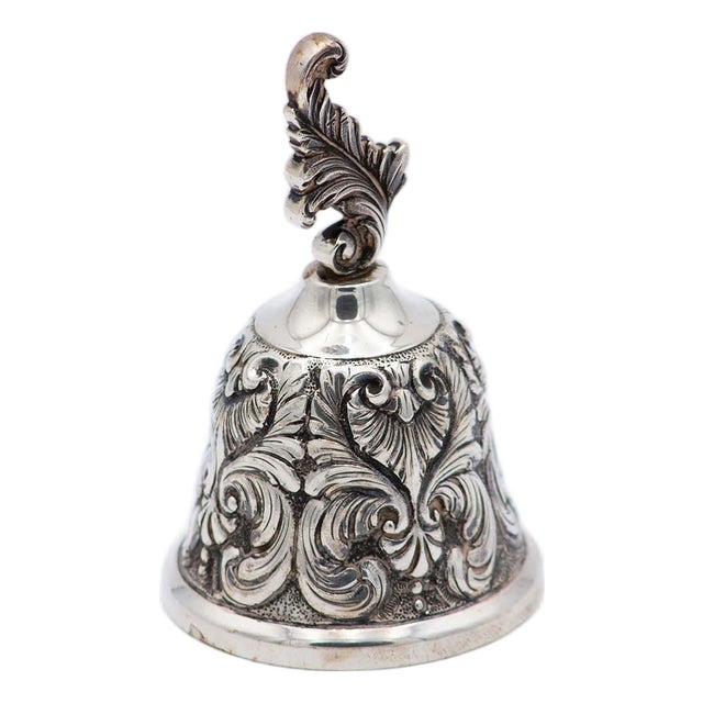 Chiseled Silver Bell with Feathers and Plant-Based Elements For Sale