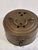 A fascinating vintage brass cricket box or incense burner handcrafted in India. This small cylindrical container features...