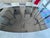 Artefacto brand Elegant contemporary dining table by Artefacto featuring a substantial smoked tempered glass oval top...