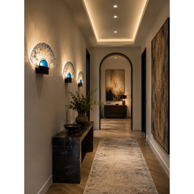 Exceptional set of six Postmodern Murano glass wall sconces, handcrafted in Italy. Each sconce features a sculptural...