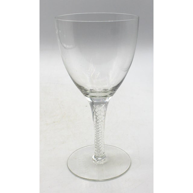 Circa 1990s set of 6 Stuart Iona crystal wine glasses, England. Distinctive air-twist swirl within the stem. Stuart was...