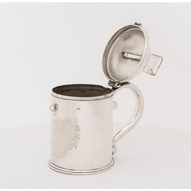 Austrian .800 Silver Tzedakah Box, 19th century, with shield decoration to the front, thumb plate to handle, and hinged...