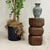 "About This Piece About This Piece This sculptural wooden pedestal combines raw natural texture with bold geometric form....