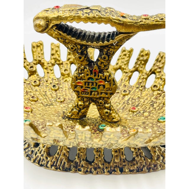 This marvelous mid-century treasure is not only beautiful in form, but wonderfully functional! The brutalist brass design...