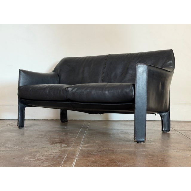 1980’s Mario Bellini for Cassina Leather Settee in good vintage condition. Some cracks on the leather, patinated leather...