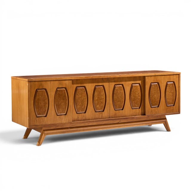 Young Manufacturing Mid Century Walnut and Burlwood Sliding Door Credenza and Hutch The credenza measures: 72 wide x 19...