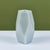 Hand blown glass faceted vase by Robert Kuo, c.2000s, USA. The vase was produced using the peking glass method which...