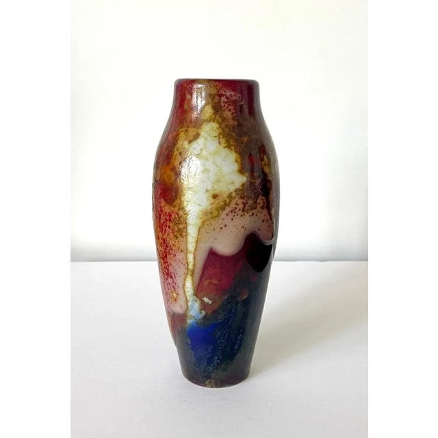 A glazed ceramic vase in slender spindle form from the Chang Ware series by Royal Doulton (England, founded 1815) circa...