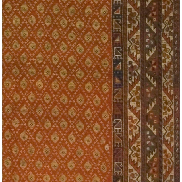 Late-19th-century rug woven by the Qashqa'i tribe in Iran with beautiful geometric patterns and floral motifs. colors:...