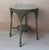 Green painted Lloyd Loom table Good condition. No breaks to the weave. Original paint and original plate glass top. Dated...