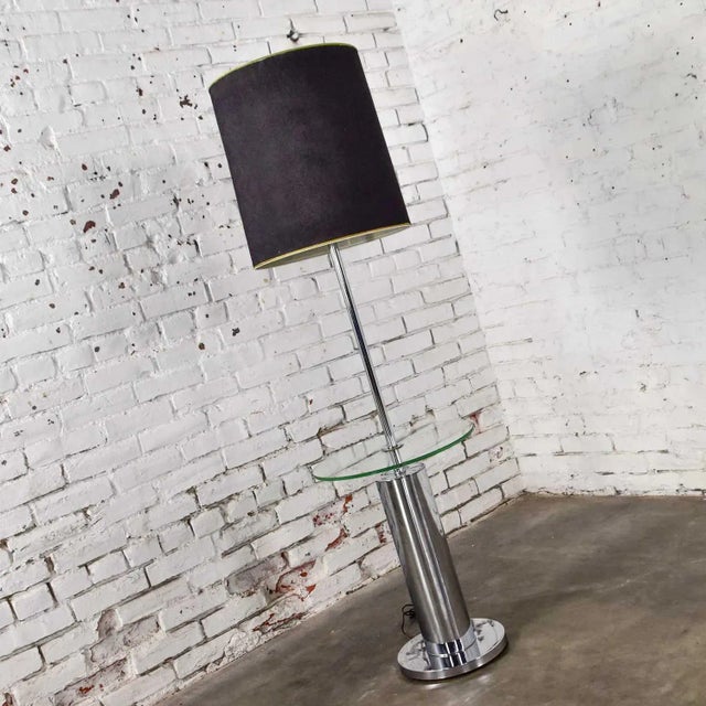 Fabulous modern chrome cylinder floor lamp in the style of George Kovacs. Comprised of a round chrome base, wide cylinder...