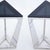 Stylish pair of Italian Modern triangular side tables. Bases are made with polished statuary marble, cut in dynamic...