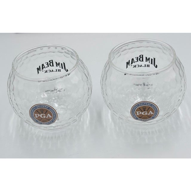 Get ready to tee off your evening with this amazing VTG 2016 PGA Jim Beam Golf Ball Shaped Whiskey Glass Set! This...