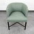 Scandinavian upholstered arm chair in solid wood. upholstered in a green fabric. Recently imported from Denmark.