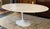 Design Plus Gallery presents a Saarinen-Style Oval Tulip Dining Table from NJ Modern Furniture. The table has an oval...