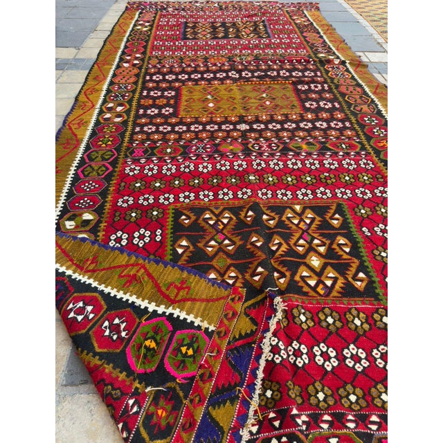 Bring authentic Anatolian heritage into your space with this monumental, hand-woven vintage Avsar kilim. Measuring an...