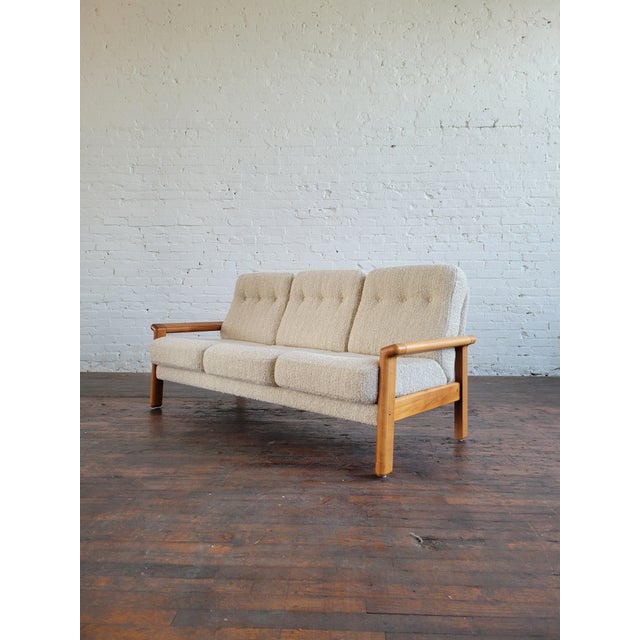 80s/90s Teak 3 seater sofa in brand new cozy beige and cream bouclé. Made in Canada by KSL. Heavily inspired by Danish...
