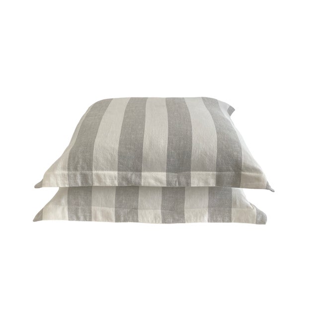 Pair of custom gray and white linen pillow shams with white twill back and envelope closure. Includes custom 90/10...