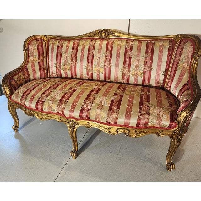 Antique Italian 18th Century Louis XV Rococco Settee Loveseat. Carved and Gilded Wood. Rare three front leg design with...