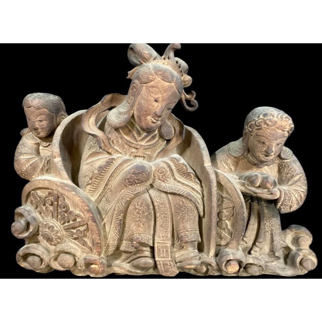 Hand Carved Figural panel, depicting three female figures, riding in a cart. Intricate details to facial expressions and...