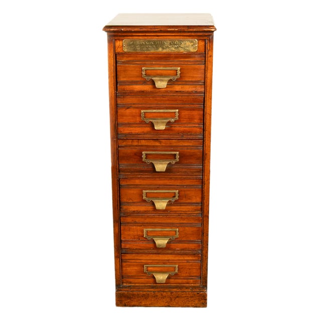 An good antique Edwardian Period walnut six drawer filing cabinet by The Shannon File Company Ltd, New York, circa 1910....