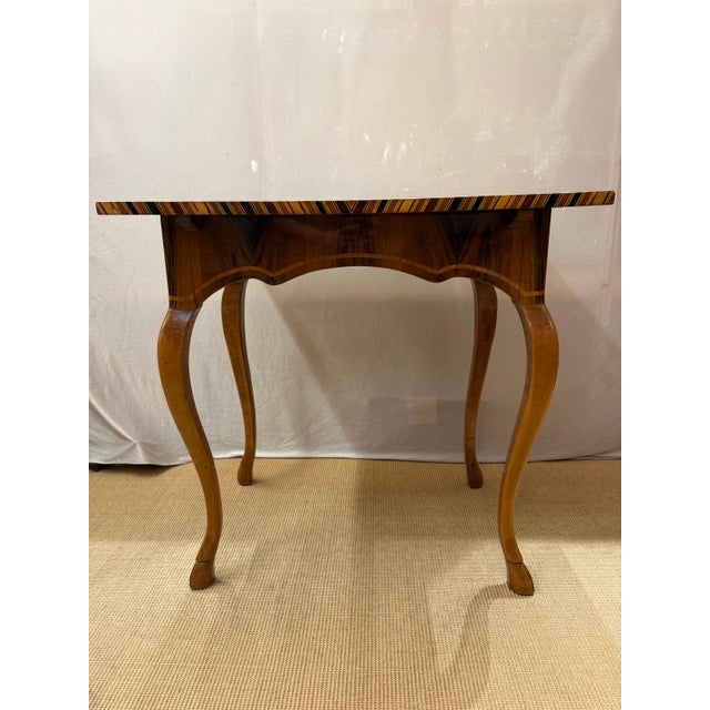 A fine and rare early 18th-century baroque side table, circa 1700–1730. The table is distinguished by its extraordinarily...