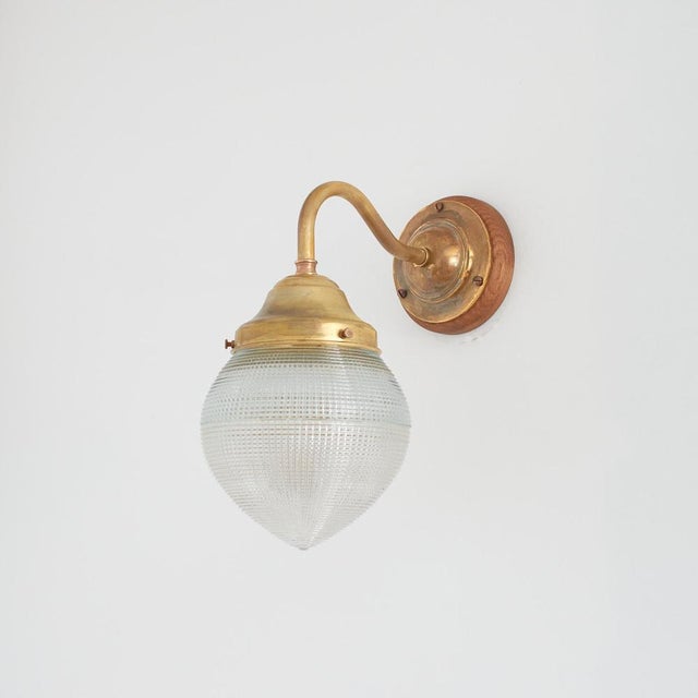 antique decorative acorn holophane brass wall light – a an elegant antique holophane brass wall light. The light has a...