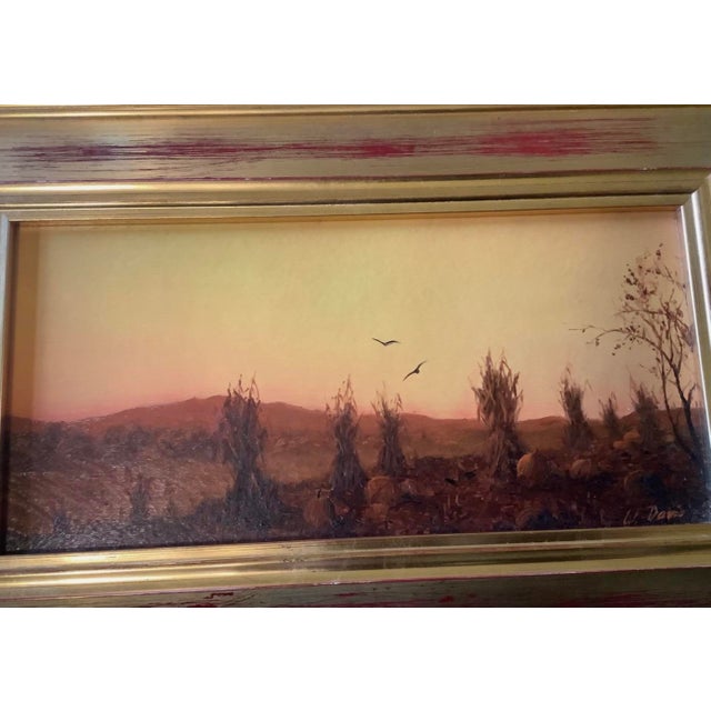 Original oil painting on board by William Robert Davis featuring a hay and pumpkin field at sunset. The piece is...