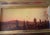 Original oil painting on board by William Robert Davis featuring a hay and pumpkin field at sunset. The piece is...