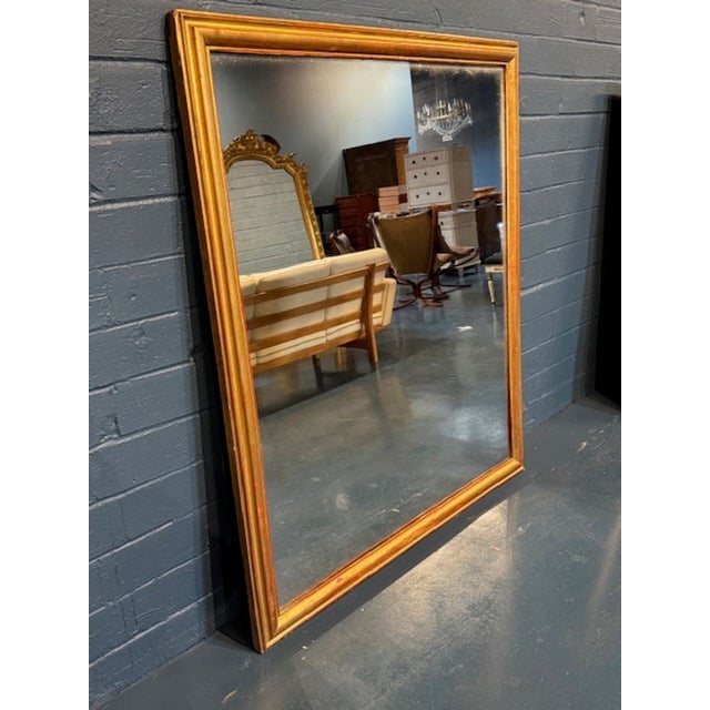 Introducing a lovely19th century French transitional mirror, perfect for adding a touch of antique elegance to any space....