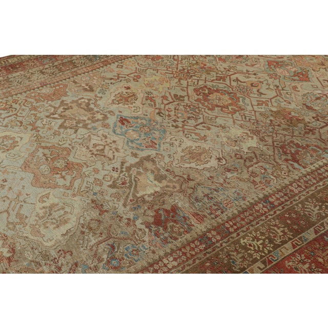 Hand knotted in wool and originating from Turkey circa 1910-1920, this 9x11 antique rug hails from the Ghiordes region of...