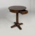 Italian 1800s style wooden round dining table, 1930s Dining table made entirely of wood. The top is round and features a...