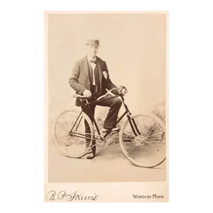 Antique Photograph of Man and Bicycle
